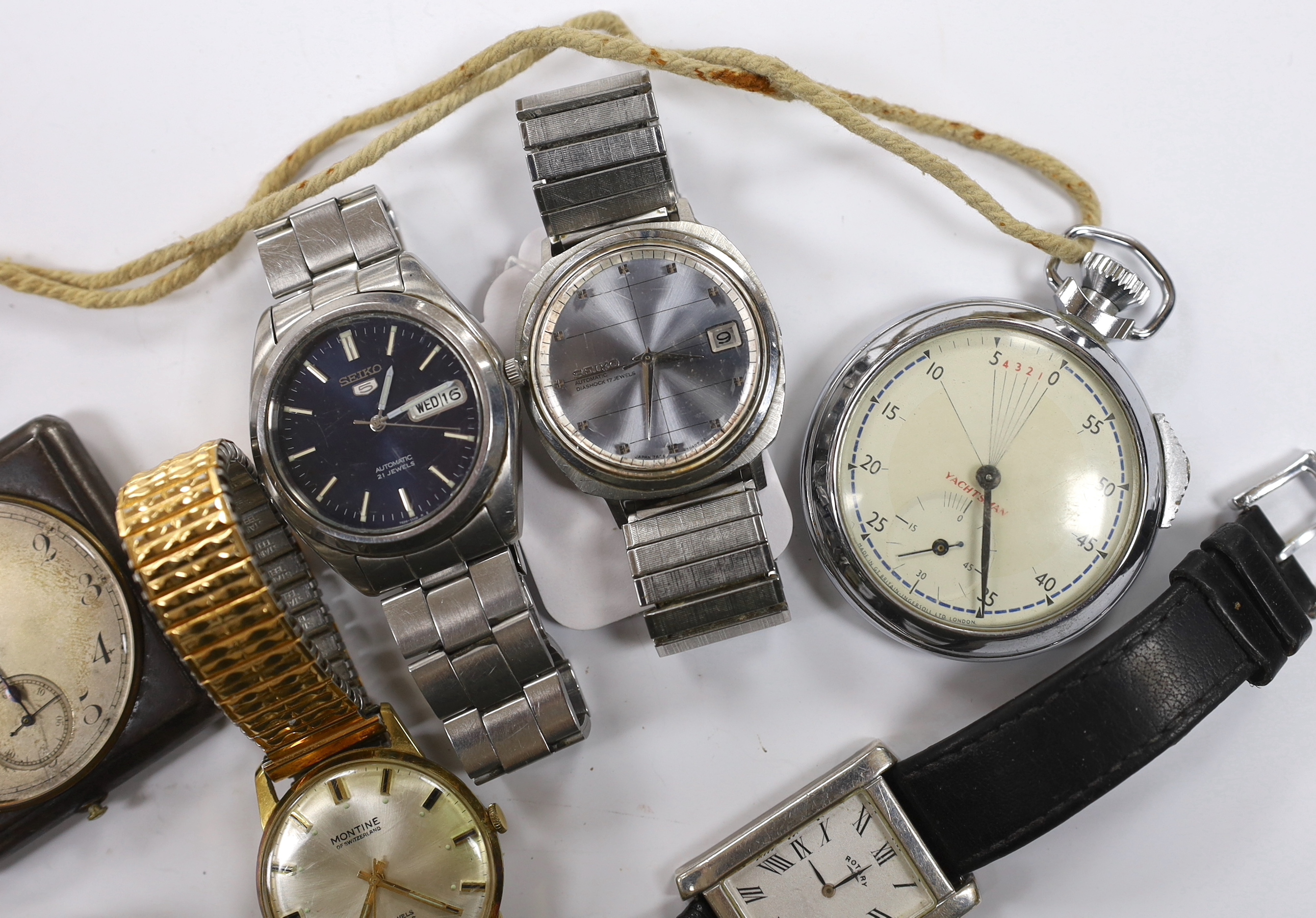 Six assorted gentleman's wrist watches including a Seiko Diashock automatic, two other Seiko watches and a sterling Rotary watch, together with a gun metal travelling timepiece and a 'Yachtsman' stop watch.